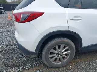 2015 Mazda CX-5 Touring with VIN JM3KE2CY4F0436664, listed as a IAAI auction lot 41876238 with 374,305 mi miles. Bid and sale history available at carsss.com. Image 19.