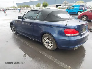 2010 BMW 1 Series 128i with VIN WBAUL7C58AVJ77695, listed as a IAAI auction lot 41938031 with Not Provided miles and . Bid and sale history available at carsss.com. Image 3.