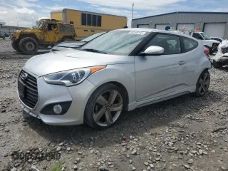 2013 Hyundai Veloster Turbo z VIN KMHTC6AE7DU171078, wystawiony jako Copart lot #56199105 z przebiegiem 94 769 mil mil oraz Szkody całkowita. Historia ofert i sprzedaży dostępna na DreamBid. Obrazek 1.