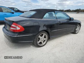 2004 Mercedes-Benz CLK 500 with VIN WDBTK75G04T005692, listed as a Copart auction lot 77038514 with 125,997 mi miles and Salvage Title. Bid and sale history available at DreamBid. Image 3.