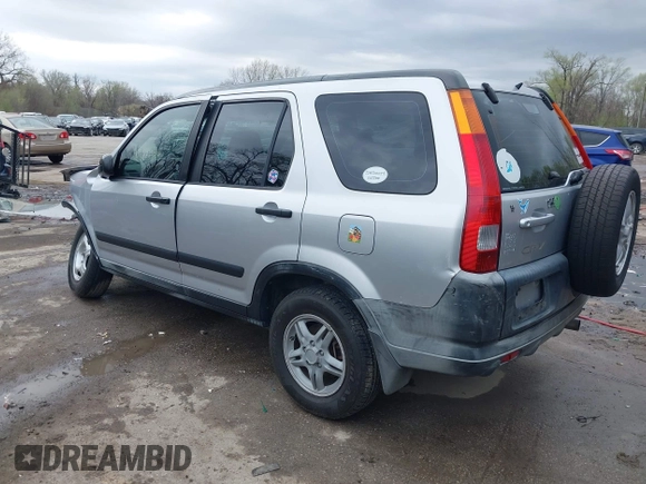 2002 Honda CR-V LX z VIN JHLRD78402C077631, wystawiony jako IAAI lot #41918750 z przebiegiem 186 827 mil mil oraz . Historia ofert i sprzedaży dostępna na DreamBid. Obrazek 3.