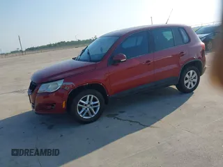 2011 Volkswagen Tiguan SEL w/Premium Navi with VIN WVGAV7AX4BW001402, listed as a IAAI auction lot 42406619 with 183,035 mi miles and . Bid and sale history available at DreamBid. Image 2.