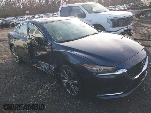 2018 Mazda Mazda6 Grand Touring Reserve with VIN JM1GL1WY9J1321670, listed as a IAAI auction lot 41401543 with 33,679 mi miles. Bid and sale history available at carsss.com. Image 1.