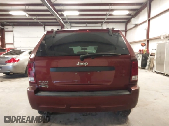 2007 Jeep Grand Cherokee Laredo with VIN 1J8GR48K97C631672, listed as a IAAI auction lot 41520054 with 231,576 mi miles. Bid and sale history available at carsss.com. Image 16.