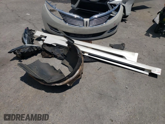 2016 Lincoln MKZ z VIN 3LN6L2GK0GR615898, wystawiony jako Copart lot #62814285 z przebiegiem 231 270 mil mil oraz Szkoda całkowita • Salvage title. Historia ofert i sprzedaży dostępna na DreamBid. Obrazek 12.