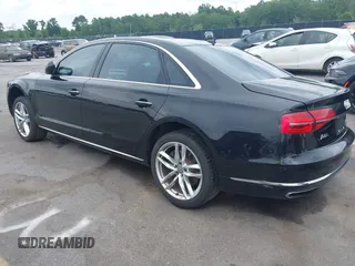 2015 Audi A8 4.0T z VIN WAU32AFD9FN023826, wystawiony jako IAAI lot #42353372 z przebiegiem 94 833 mil mil oraz . Historia ofert i sprzedaży dostępna na DreamBid. Obrazek 3.