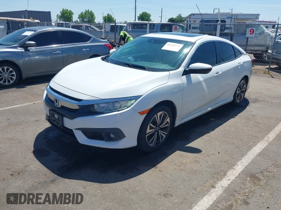 2016 Honda Civic EX-L z VIN 2HGFC1F83GH636374, wystawiony jako IAAI lot #42328432 z przebiegiem 130 738 mil mil oraz . Historia ofert i sprzedaży dostępna na DreamBid. Obrazek 17.