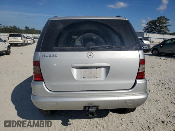 2000 Mercedes-Benz M-Class with VIN 4JGAB54E3YA158805, listed as a Copart auction lot 78047374 with 234,568 mi miles and Salvage Title. Bid and sale history available at carsss.com. Image 6.