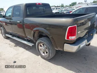 2013 Ram 2500 Laramie with VIN 3C6UR5FL7DG529590, listed as a IAAI auction lot 42266965 with 141,603 mi miles and . Bid and sale history available at DreamBid. Image 3.