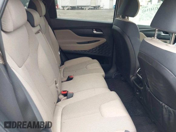 2019 Hyundai Santa Fe SE z VIN 5NMS2CADXKH005960, wystawiony jako IAAI lot #42341142 z przebiegiem 71 617 mil mil oraz . Historia ofert i sprzedaży dostępna na DreamBid. Obrazek 8.