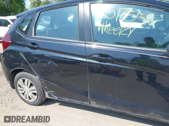 2015 Honda Fit LX z VIN 3HGGK5H51FM724566, wystawiony jako IAAI lot #42151755 z przebiegiem 168 744 mil mil oraz . Historia ofert i sprzedaży dostępna na DreamBid. Obrazek 17.