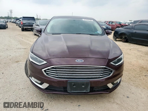 2017 Ford Fusion Titanium with VIN 3FA6P0K90HR178834, listed as a Copart auction lot 57420795 with 127,977 mi miles and Salvage title. Bid and sale history available at DreamBid. Image 5.