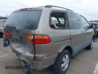 1999 Toyota Sienna LE with VIN 4T3ZF13C5XU121145, listed as a IAAI auction lot 41721171 with 229,760 mi miles and . Bid and sale history available at DreamBid. Image 4.