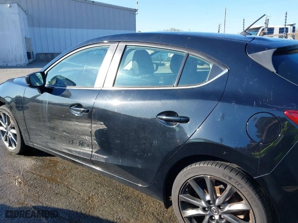 2018 Mazda Mazda3 5-Door Touring with VIN 3MZBN1L31JM200628, listed as a IAAI auction lot 41680209 with 95,656 mi miles. Bid and sale history available at carsss.com. Image 15.