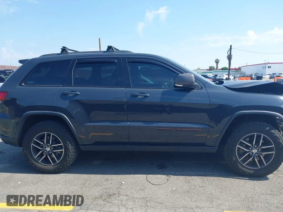 2018 Jeep Grand Cherokee Trailhawk with VIN 1C4RJFLT0JC316172, listed as a IAAI auction lot 42174162 with 81,891 mi miles and . Bid and sale history available at DreamBid. Image 13.