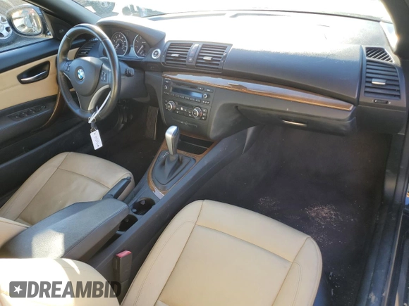 2010 BMW 1 Series 128i with VIN WBAUN1C56AVH82146, listed as a Copart auction lot 79296544 with 79,976 mi miles and Salvage title. Bid and sale history available at DreamBid. Image 8.