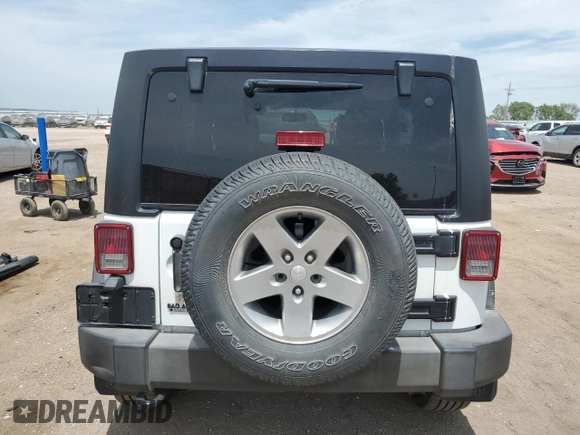 2015 Jeep Wrangler Unlimited Sport with VIN 1C4BJWDG2FL545561, listed as a Copart auction lot 60574045 with 83,592 mi miles and Salvage title. Bid and sale history available at DreamBid. Image 6.
