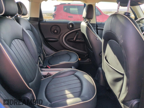 2012 MINI Countryman S with VIN WMWZC3C57CWL80976, listed as a Copart auction lot 50023105 with 74,504 mi miles and Salvage Title. Bid and sale history available at DreamBid. Image 11.