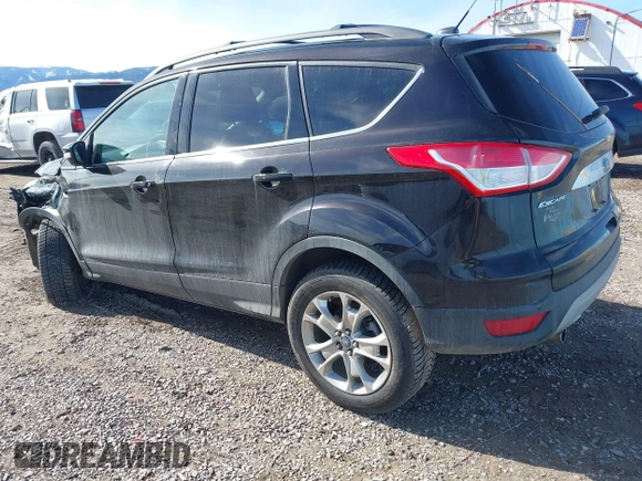 2013 Ford Escape SEL with VIN 1FMCU9H93DUB56102, listed as a IAAI auction lot 41809309 with 60,498 mi miles. Bid and sale history available at carsss.com. Image 3.