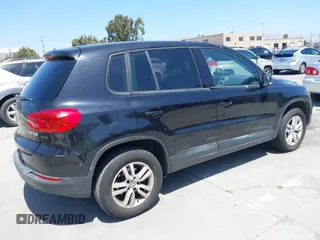 2013 Volkswagen Tiguan SE with VIN WVGAV7AXXDW542019, listed as a IAAI auction lot 42482696 with 193,383 mi miles and . Bid and sale history available at DreamBid. Image 4.
