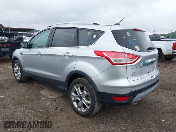2015 Ford Escape Titanium with VIN 1FMCU0JX7FUB60418, listed as a IAAI auction lot 42485107 with 82,172 mi miles and . Bid and sale history available at DreamBid. Image 3.