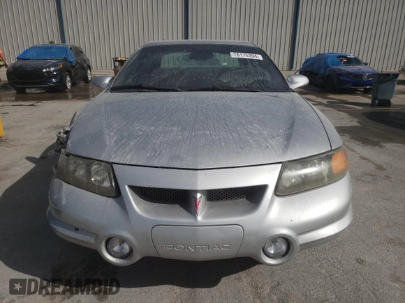 2003 Pontiac Bonneville SLE z VIN 1G2HY54K334173324, wystawiony jako Copart lot #78175394 z przebiegiem 130 829 mil mil oraz Szkoda całkowita • Salvage title. Historia ofert i sprzedaży dostępna na DreamBid. Obrazek 5.