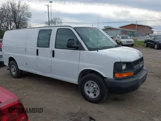 2014 Chevrolet Express Cargo Van with VIN 1GCWGGCA4E1209164, listed as a IAAI auction lot 41838141 with 174,770 mi miles. Bid and sale history available at carsss.com. Image 13.