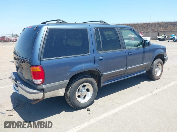 1999 Ford Explorer XLT z VIN 1FMDU34EXXZA79739, wystawiony jako IAAI lot #42353736 z przebiegiem 377 224 mil mil oraz . Historia ofert i sprzedaży dostępna na DreamBid. Obrazek 4.