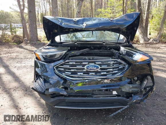 2022 Ford Edge Titanium with VIN 2FMPK4K95NBB06151, listed as a IAAI auction lot 41932545 with 57,762 mi miles and . Bid and sale history available at DreamBid. Image 12.