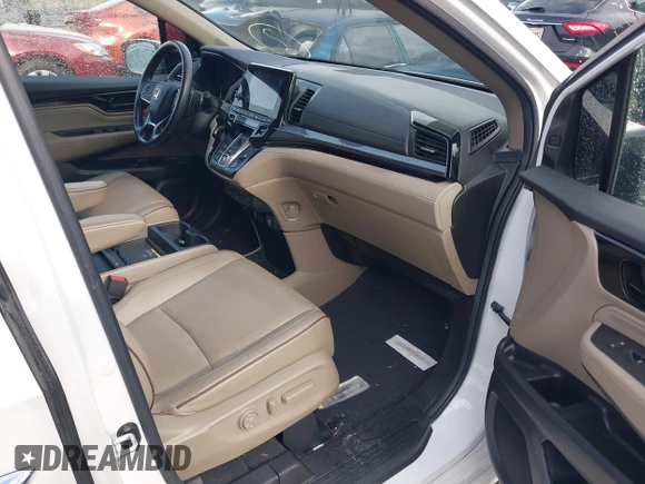 2022 Honda Odyssey Elite with VIN 5FNRL6H91NB040519, listed as a IAAI auction lot 41992662 with 34,001 mi miles and . Bid and sale history available at DreamBid. Image 5.