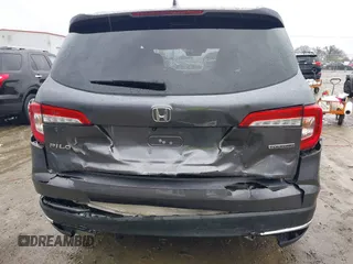 2021 Honda Pilot Touring 8-Passenger with VIN 5FNYF5H9XMB014190, listed as a IAAI auction lot 41749586 with 67,602 mi miles and . Bid and sale history available at DreamBid. Image 6.