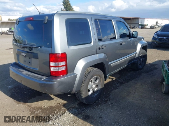 2012 Jeep Liberty Sport with VIN 1C4PJLAK2CW190883, listed as a IAAI auction lot 42066260 with 180,715 mi miles and . Bid and sale history available at carsss.com. Image 4.