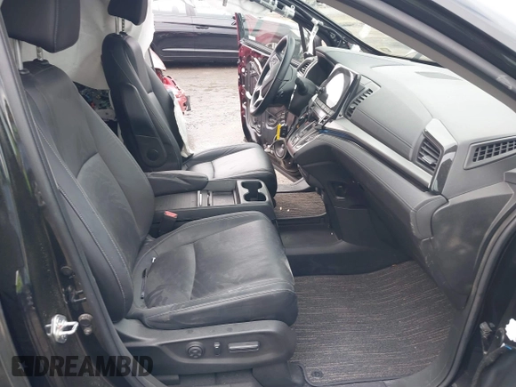 2023 Honda Odyssey Touring with VIN 5FNRL6H81PB068721, listed as a IAAI auction lot 41489618 with 20,202 mi miles and . Bid and sale history available at DreamBid. Image 5.