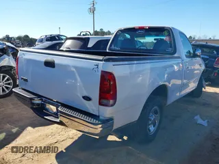 2001 Ford F-150 XL z VIN 1FTRF17L61NB04122, wystawiony jako IAAI lot #38304103 z przebiegiem 186 816 mil mil oraz . Historia ofert i sprzedaży dostępna na DreamBid. Obrazek 4.