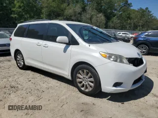 2014 Toyota Sienna LE AAS z VIN 5TDKK3DC0ES465228, wystawiony jako Copart lot #54427125 z przebiegiem 173 811 mil mil oraz Szkoda całkowita • Salvage title. Historia ofert i sprzedaży dostępna na DreamBid. Obrazek 4.
