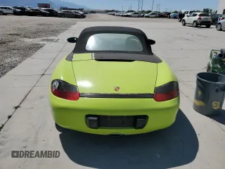 1999 Porsche Boxster with VIN WP0CA2987XU622760, listed as a Copart auction lot 59898355 with 104,425 mi miles and Salvage title. Bid and sale history available at DreamBid. Image 6.