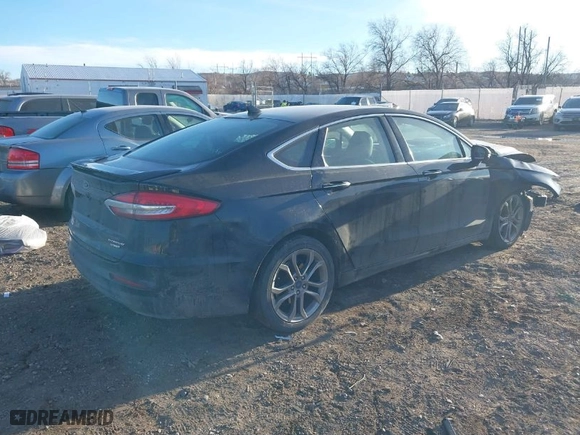2020 Ford Fusion Hybrid Titanium with VIN 3FA6P0RU9LR141476, listed as a IAAI auction lot 41472921 with 84,433 mi miles. Bid and sale history available at carsss.com. Image 4.
