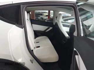 2022 Tesla Model Y Performance with VIN 7SAYGDEF4NF449986, listed as a IAAI auction lot 41754916 with 64,384 mi miles and . Bid and sale history available at DreamBid. Image 8.