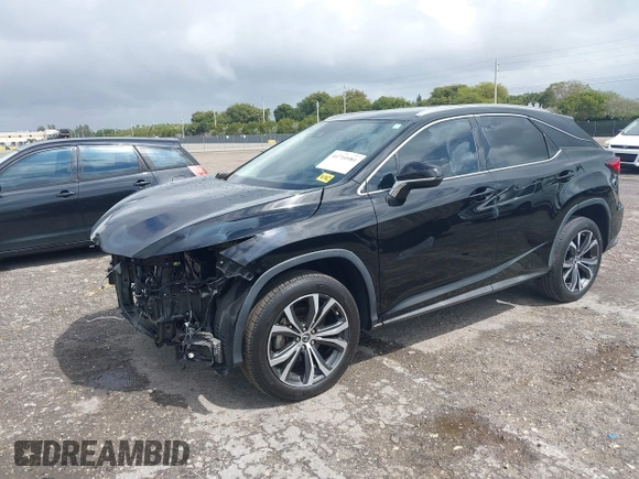 2020 Lexus RX 350 with VIN 2T2HZMAA9LC153571, listed as a IAAI auction lot 41710981 with 34,354 mi miles and . Bid and sale history available at DreamBid. Image 2.