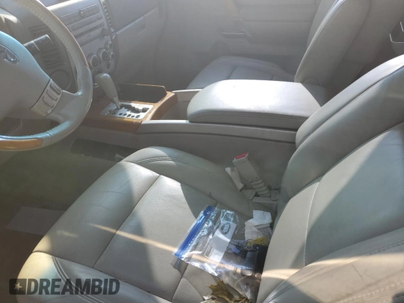 2006 Infiniti QX56 z VIN 5N3AA08A76N810044, wystawiony jako Copart lot #74182384 z przebiegiem Nie podano mil oraz Szkoda całkowita • Salvage title. Historia ofert i sprzedaży dostępna na DreamBid. Obrazek 7.