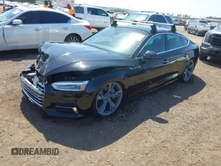 2018 Audi A5 Sportback Premium z VIN WAUANCF53JA003557, wystawiony jako IAAI lot #42079150 z przebiegiem 78 259 mil mil oraz . Historia ofert i sprzedaży dostępna na DreamBid. Obrazek 17.