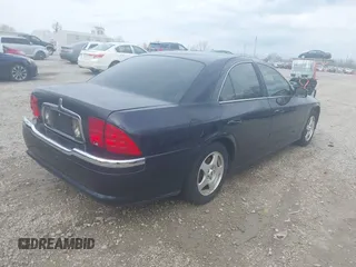 2000 Lincoln LS with VIN 1LNHM87A6YY879355, listed as a IAAI auction lot 41917760 with 70,457 mi miles. Bid and sale history available at carsss.com. Image 4.