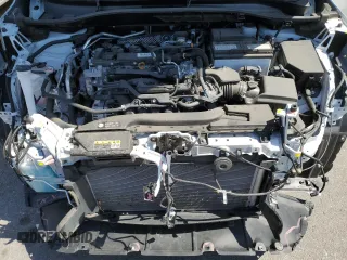 2022 Toyota Corolla Cross XLE z VIN 7MUDAABG7NV029746, wystawiony jako Copart lot #57632995 z przebiegiem 26 262 mil mil oraz Szkoda całkowita • Salvage title. Historia ofert i sprzedaży dostępna na DreamBid. Obrazek 12.