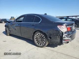 2011 BMW 7 Series 740i with VIN WBAKA4C57BC612487, listed as a Copart auction lot 82633554 with 0 mi miles and Salvage Title. Bid and sale history available at carsss.com. Image 2.