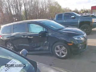2019 Honda Odyssey EX-L with VIN 5FNRL6H74KB061567, listed as a IAAI auction lot 41810919 with 129,146 mi miles. Bid and sale history available at carsss.com. Image 13.