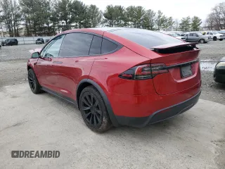 2023 Tesla Model X with VIN 7SAXCAE51PF390573, listed as a Copart auction lot 47499385 with Not Provided miles and Salvage Title. Bid and sale history available at DreamBid. Image 2.