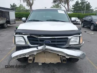 2000 Ford F-150 XL with VIN 1FTRX17L4YNA39407, listed as a IAAI auction lot 42141350 with 82,824 mi miles and . Bid and sale history available at DreamBid. Image 12.