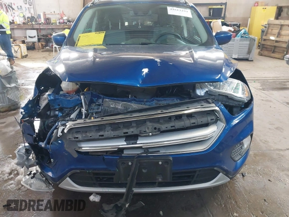 2018 Ford Escape SE z VIN 1FMCU9GD1JUB80500, wystawiony jako IAAI lot #41613294 z przebiegiem 112 187 mil mil oraz . Historia ofert i sprzedaży dostępna na DreamBid. Obrazek 6.