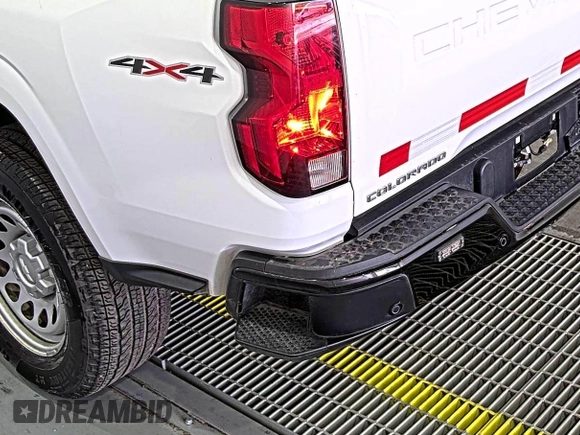 2023 Chevrolet Colorado 4WD Work Truck z VIN 1GCGTBEC2P1200144, wystawiony jako IAAI lot #42626480 z przebiegiem 29 151 mil mil oraz . Historia ofert i sprzedaży dostępna na DreamBid. Obrazek 25.
