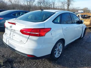 2016 Ford Focus SE with VIN 1FADP3F28GL348103, listed as a IAAI auction lot 41185718 with 69,256 mi miles. Bid and sale history available at carsss.com. Image 4.